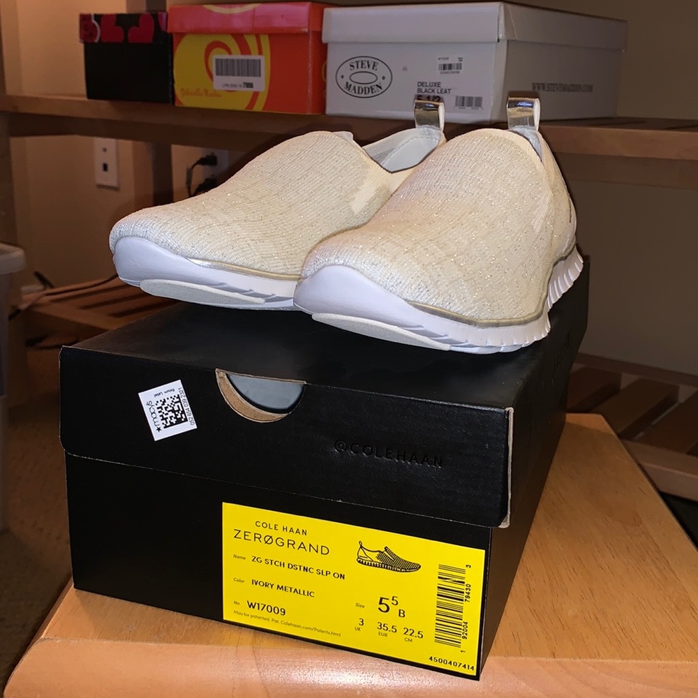white slip-on walking sneakers